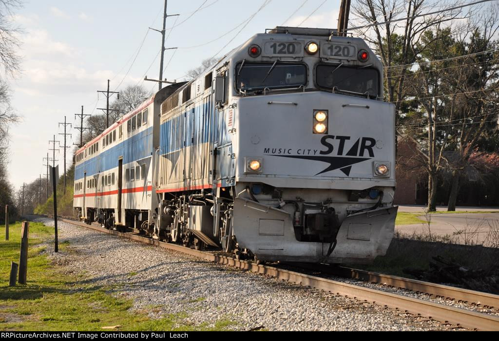 Outbound commuter rolls east